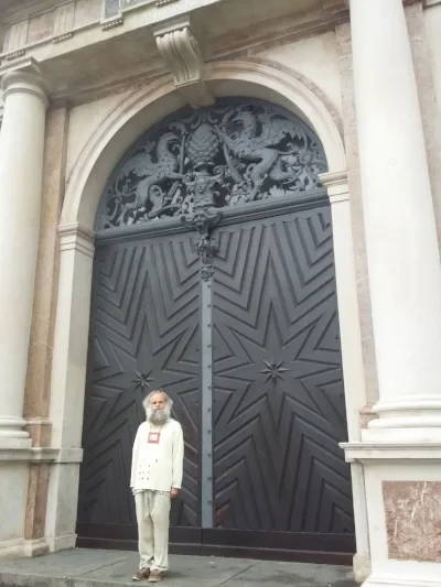 I was attempting to capture the awesome doors on the Town Hall in Augsburg. This guy was just so happy to pose for my photo, how could I say no?! Dude looks like he was enjoying his day. :)